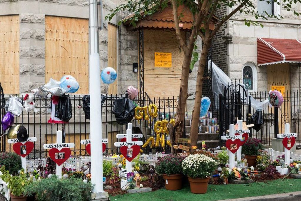 A memorial built by members of the Little Village community to commemorate a tragic fire.